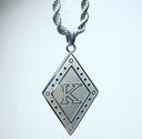 A beyond stunning Kappa Alpha Psi necklace and charm made with 24k stainless steel silver. This pendant is made to last for generations and generations, perfect for that special Kappa Alpha Psi member. The ultimate gift to show off your fraternity pride is here!  • Official Kappa Alpha Psi Licensed Product: passed through examination and requirements by the Fraternity as a whole.